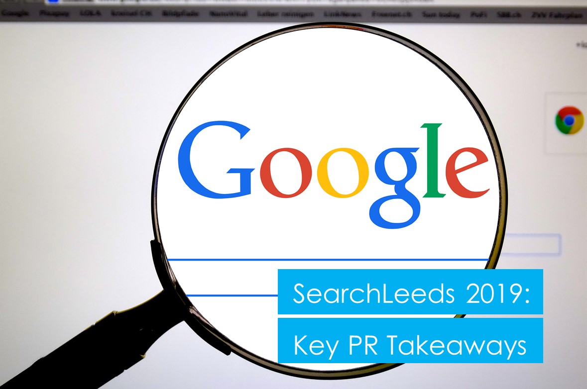 Magnifying glass looking at Google homepage