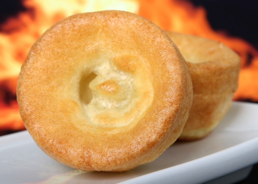 Yorkshire puddings on white plate