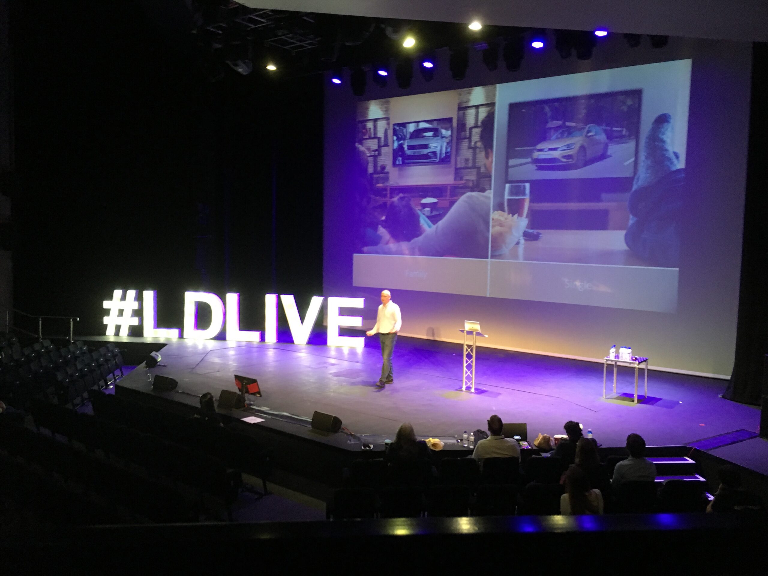 Conference speaker on stage