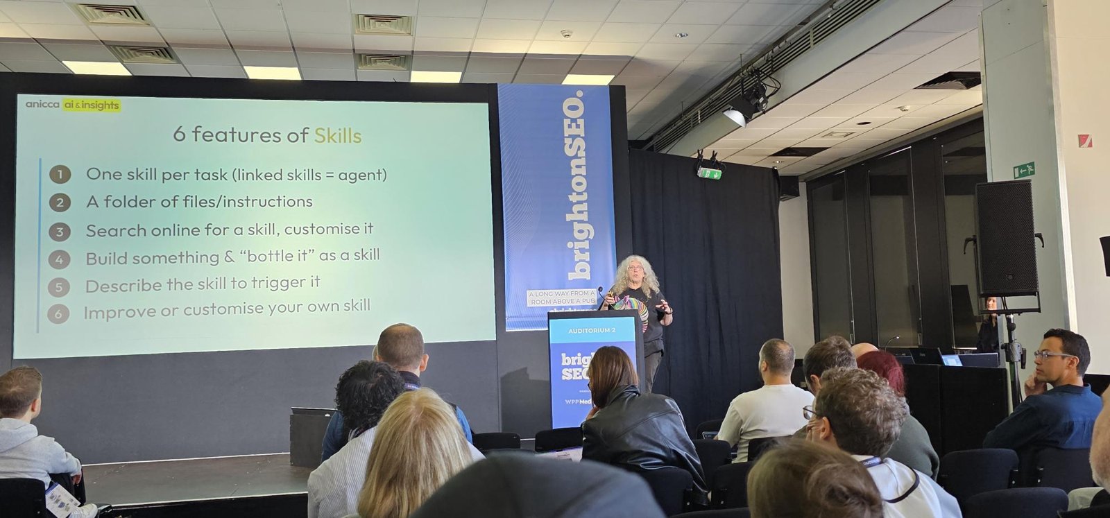 Ann Stanley presenting the six features of skills at BrightonSEO